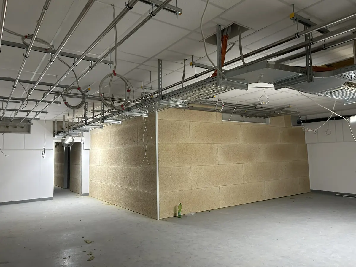 Innendämmung mit Holzwolle-Wandverkleidung im Bauvorhaben ARGE Moosach in München